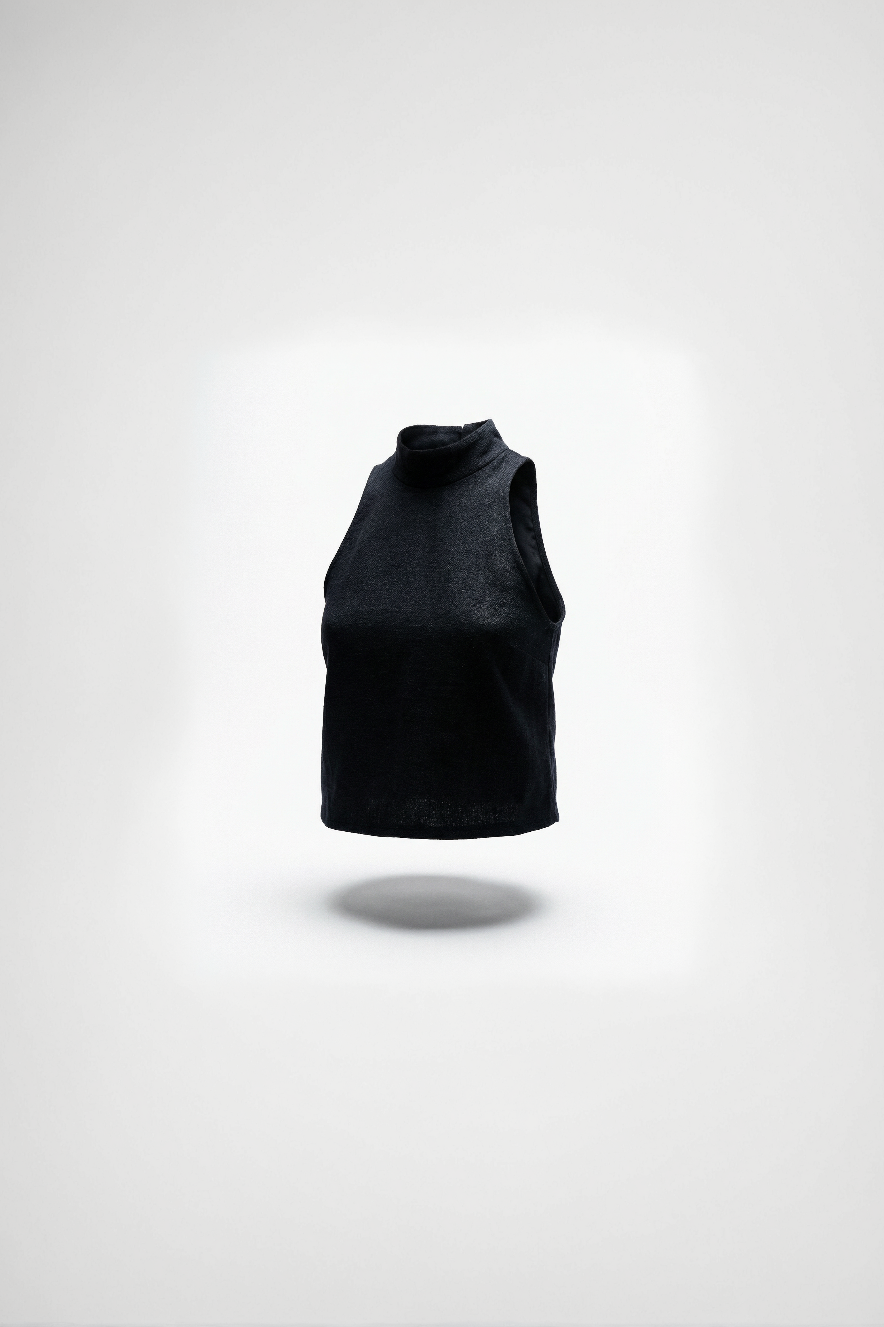 Black sleeveless top on a white background